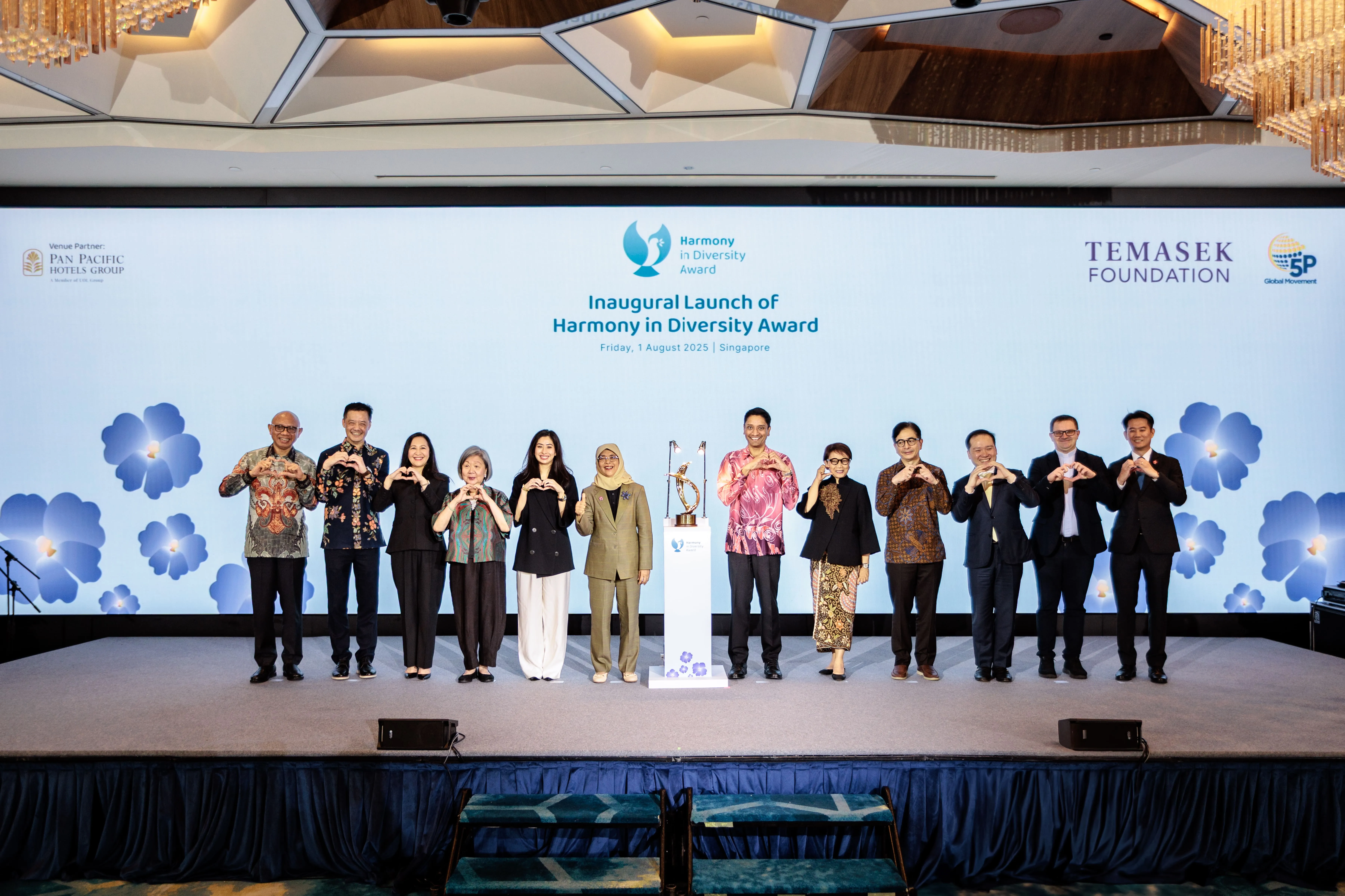 Harmony in Diversity Award — stage visual with dove motif